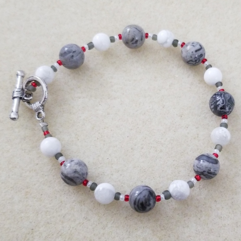 Grey, white & red glass beaded bracelet